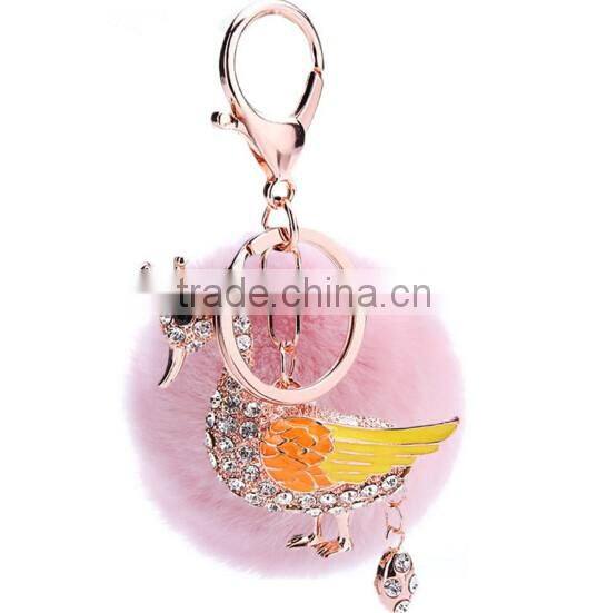 Hot selling rhinestone swan keychain with pink rabbit fur ball