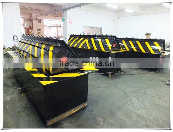 Hydraulic automated road barrier