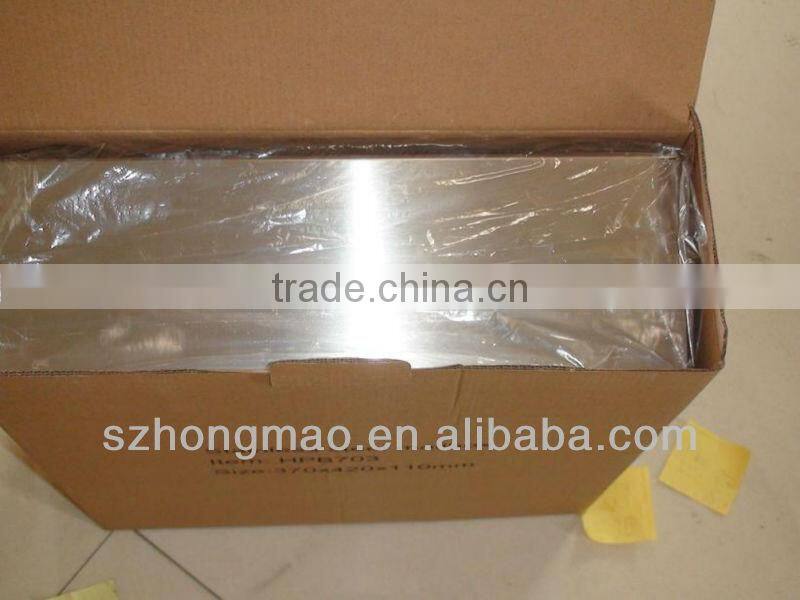 winsdows on mailbox with newspaper holder