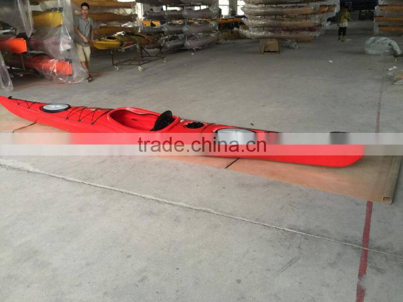 single plastic kayak with pedals / sea kayak / kayak paddle