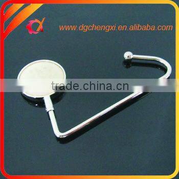 China hot sale round shape bag hanger with CX logo and metal hook