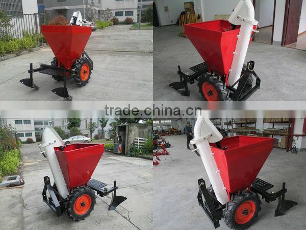 With 4x4 tractor tyres chain tension one row potato planter