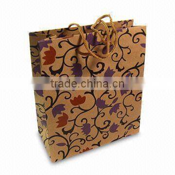 Beauty paper gift bag with polyester rope, pink print and nice design,OEM orders are welcome