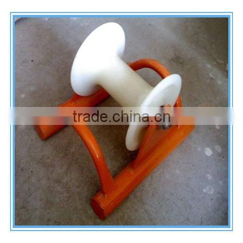 Ground cable roller, cable block