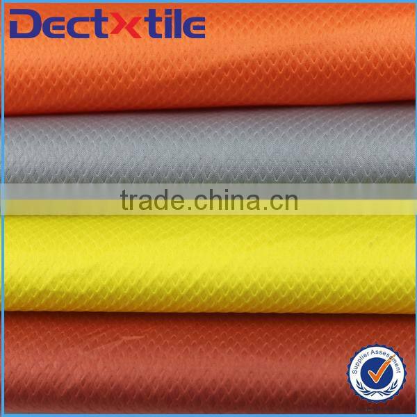 pongee type press polish calendered piezooptic fabric from China DEC TExtile