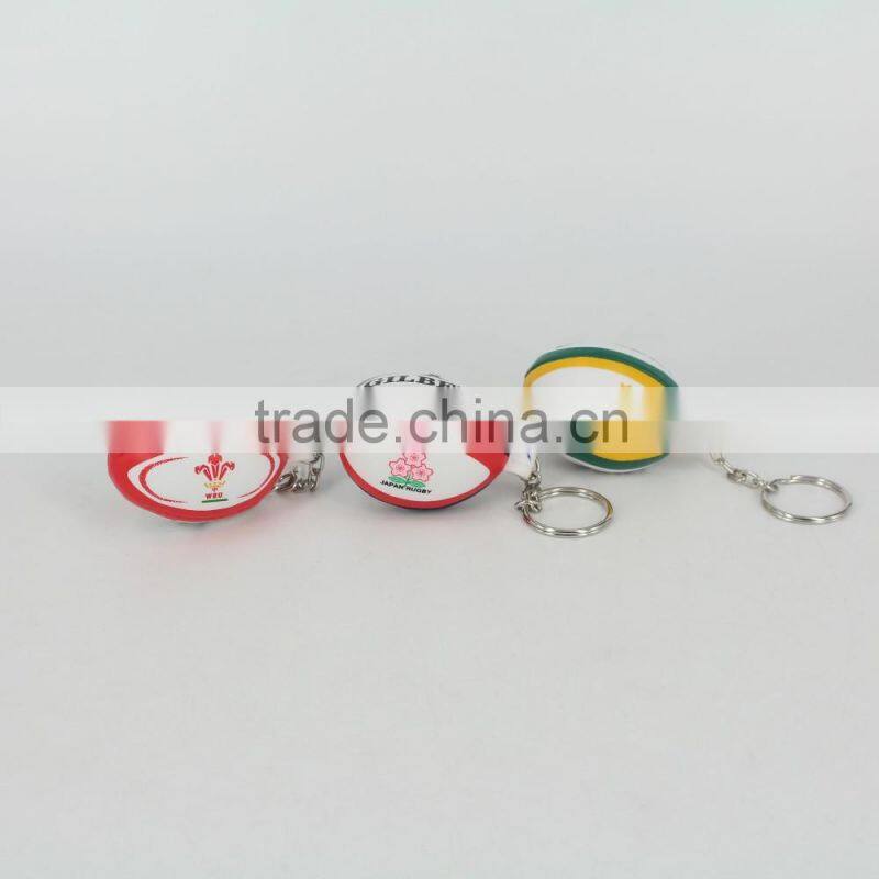 Promotion cheap cute rugby ball keychain,2016 promotional pu mini rugby ball stress ball keychain