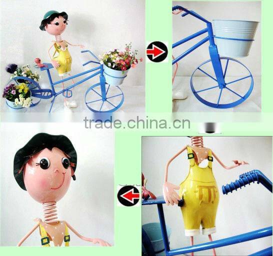 Metal Doll With Flower Pots