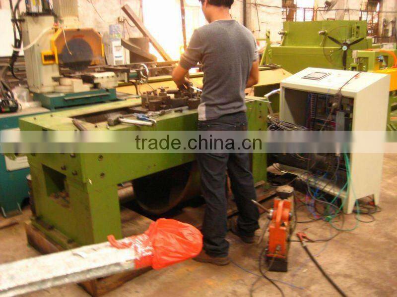 combined drawing machine- cam shear