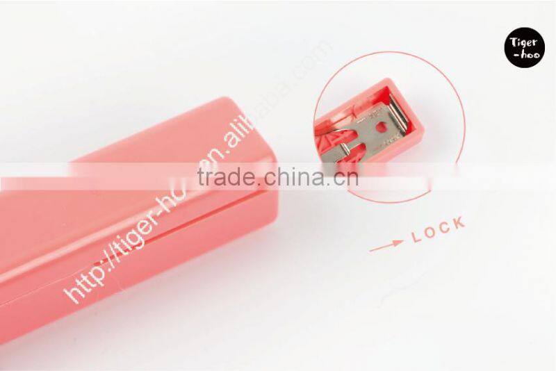 Handy mini stapler uses No. 10 Mini Staples refill