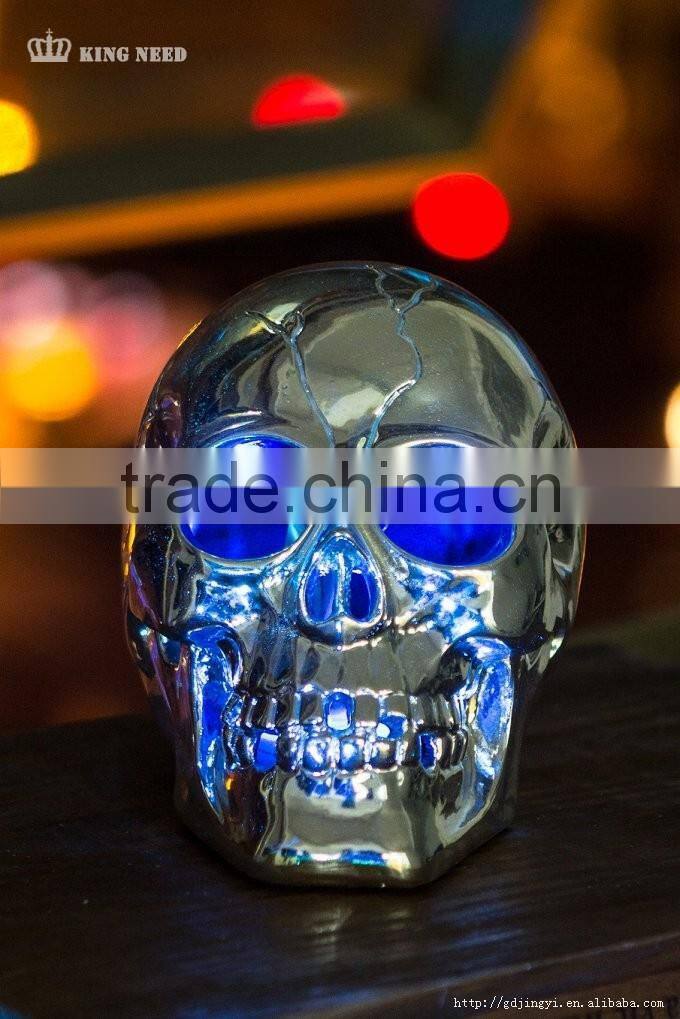 Silver plastic halloween skull head with LED light