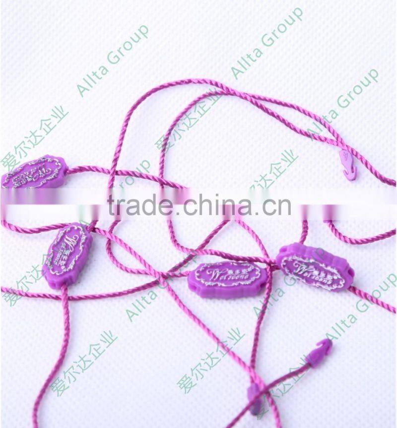 Custom plastic embossing seal tag for garment
