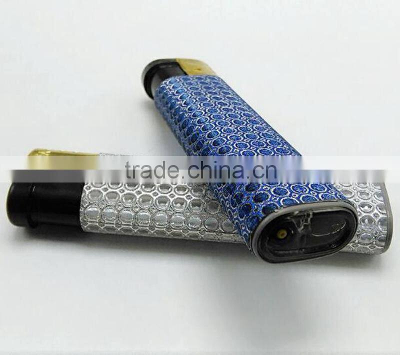 Silver match lighters colored with golden cap star lighter