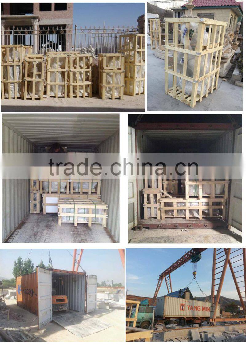 Garden playing boy and girl sculptures with teeterboard