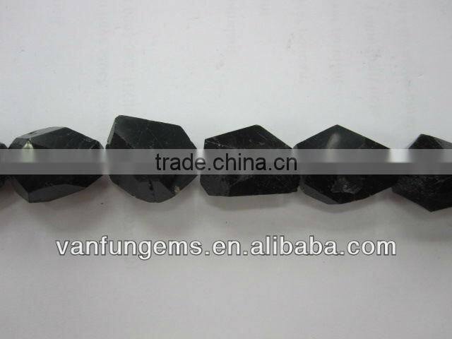 Black tourmaline faceted tumble stone
