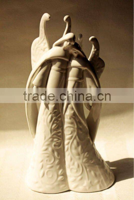 white porcelain angel figurines