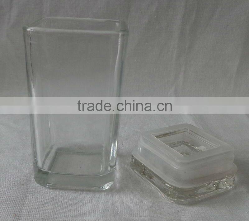 Glass candle holder with lid