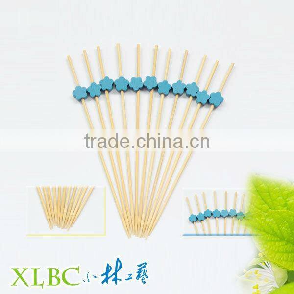 Bamboo picks with rose for party