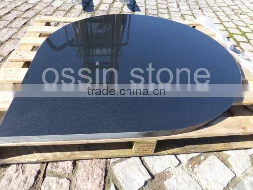 black granite hearth fireplace