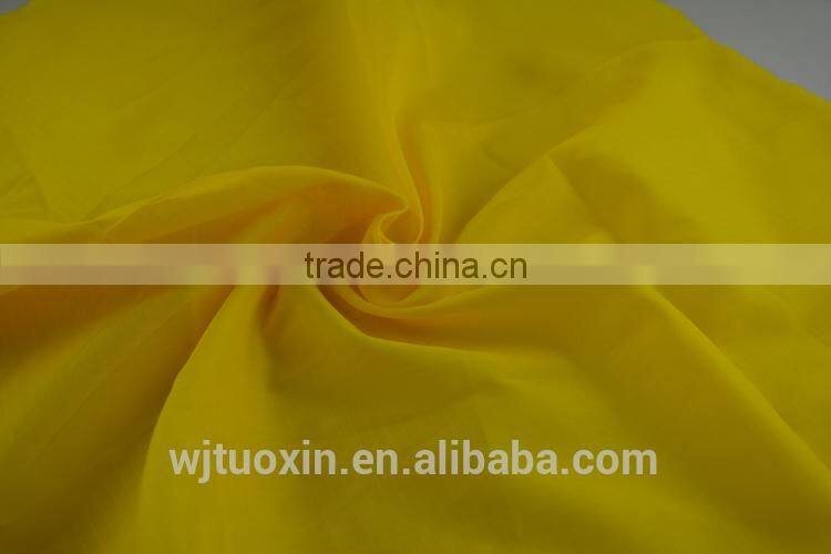 210T ripstop polyester waterproof child raincoat fabric soft smooth tough material