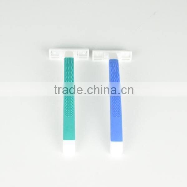 Twin blade disposable razor