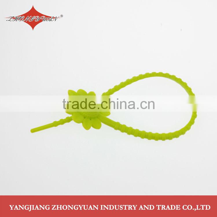 Multi-use silicone tie with sunflower head