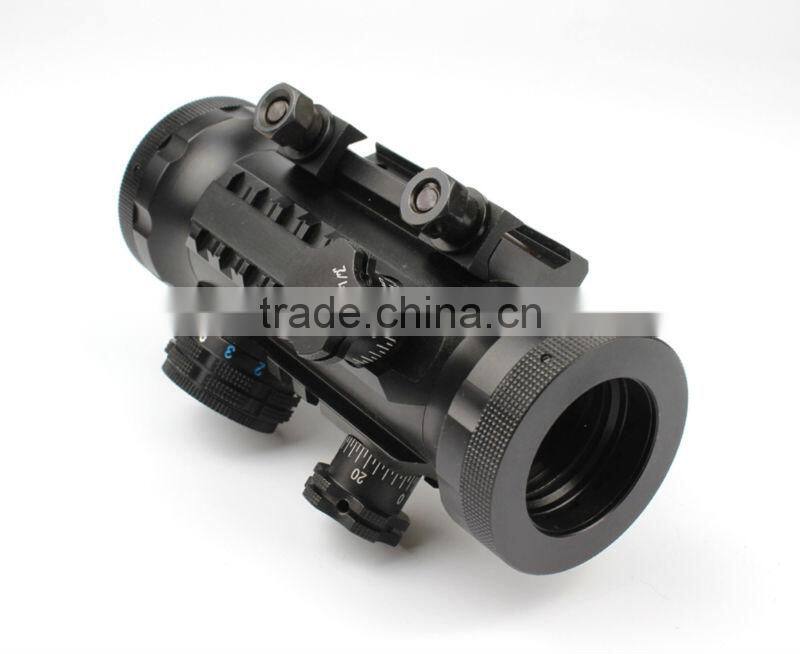 Compact red green dot riflescope with red laser attached