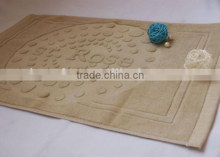 100% cotton bath mat, jacquard design with border edges, solid dyed color