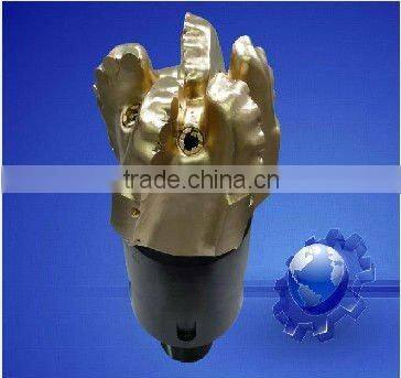 Tricone drill bit