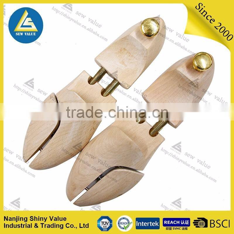 Adjustable type shoe tree in beech wood with double golden color tube and cap