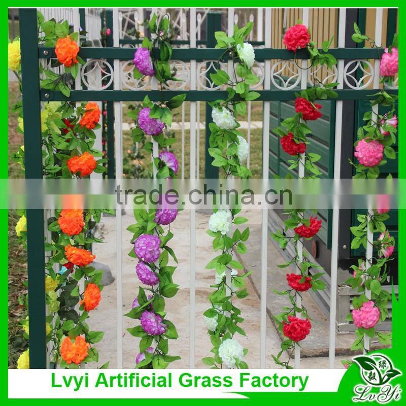Artificial green leaf vine with flowers for decoration