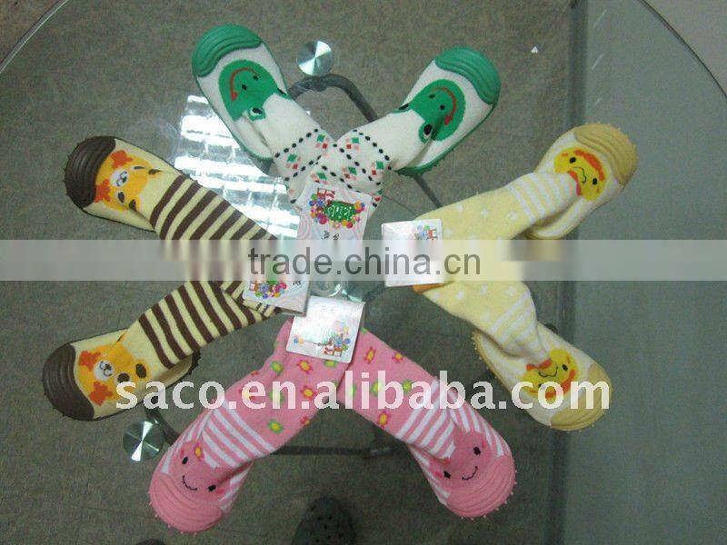 Fashion children's leather sole sock with the cartoon pattern on it