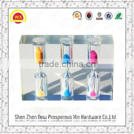 Wholesale delicate wood/plastic liquid hourglass