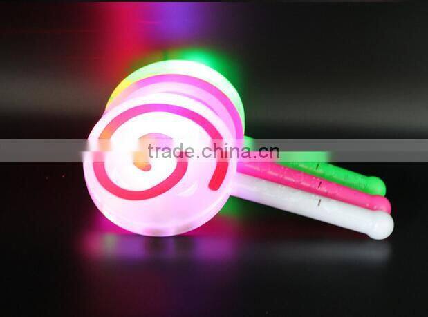 Hot sale LED lighting toys shining lollipop candy toy for kids baby rattle hand bells