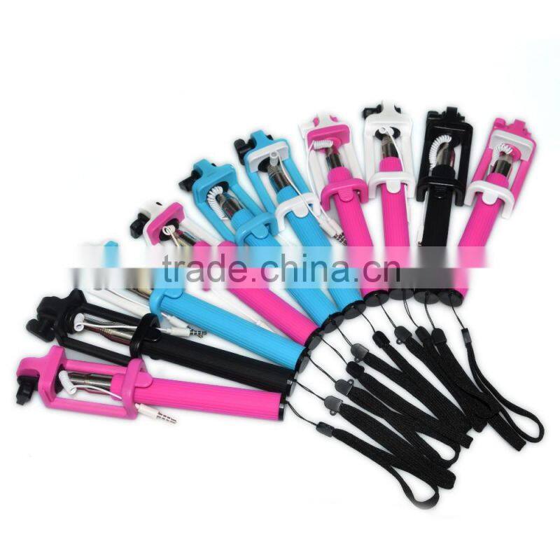 Monopod with mobile phone holder and built-in shutter release