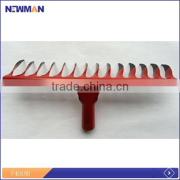 red color riveted grass lawn rake