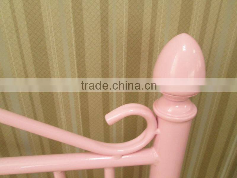 single pink folding metal bed