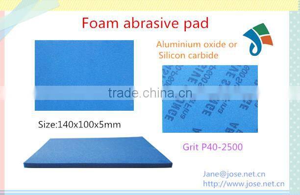 Abrasive foam sanding pad