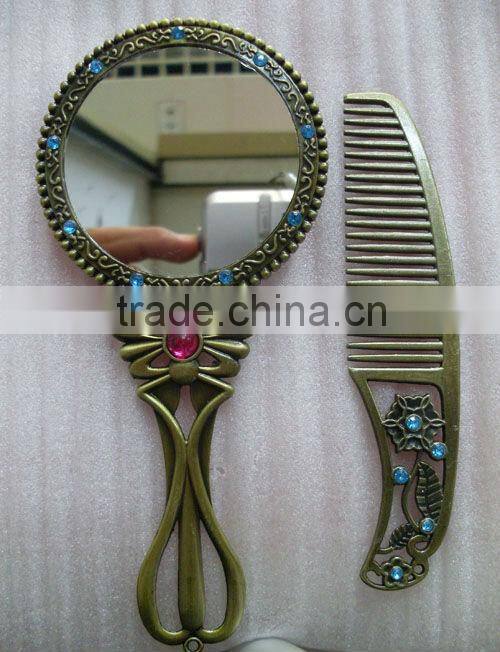 Antique bronze hand makeup mirror with comb in one set