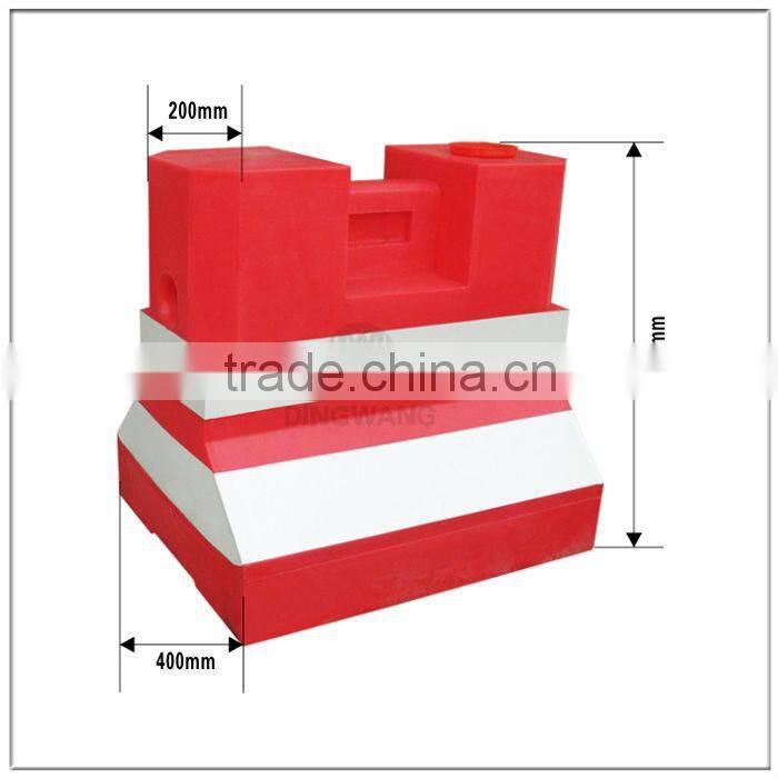 plastic jersey barriers on road