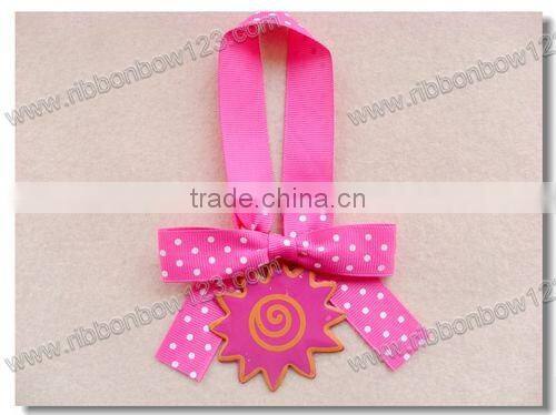 Pink logo ribbon bow with lable for gift