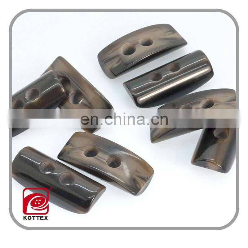 special shaped smooth surface resin imitation horn toggle buttons,2014 plastic toggle button,garment accessories