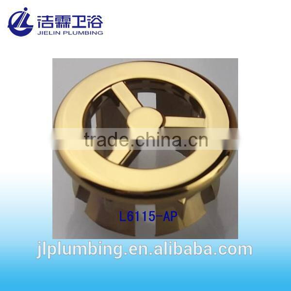 Gold lavatory overflow hole cover