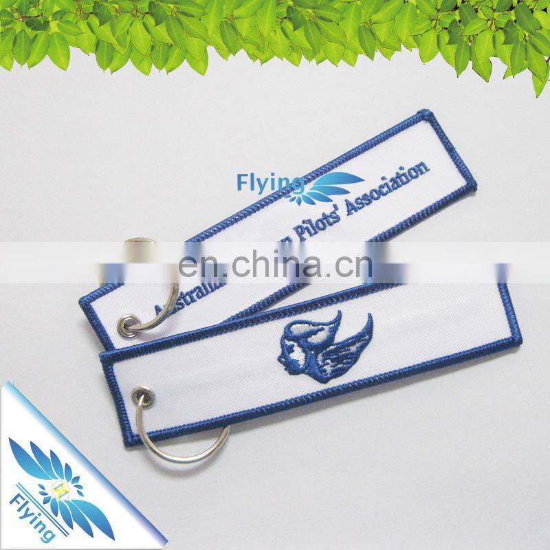 OEM keychain design, bulk cheap custom embroidery key ring with logo, airport fabric keychain for promotion