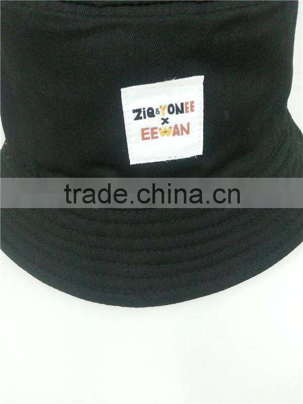 custom reversible bucket hat with woven label patch logo