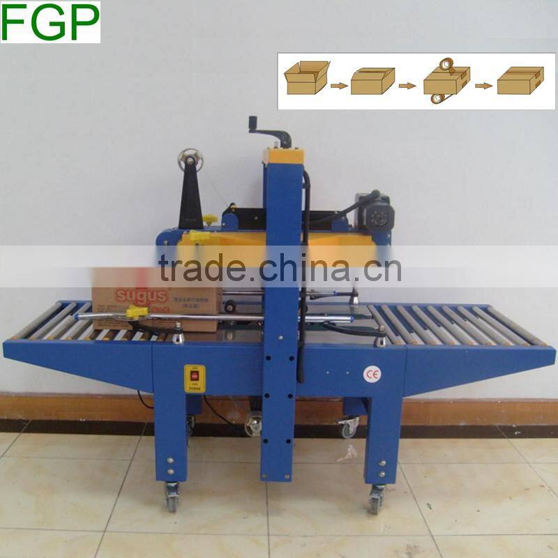 FXJ-5050 top & bottom drive paper carton automatic adhesive tape sealing machine