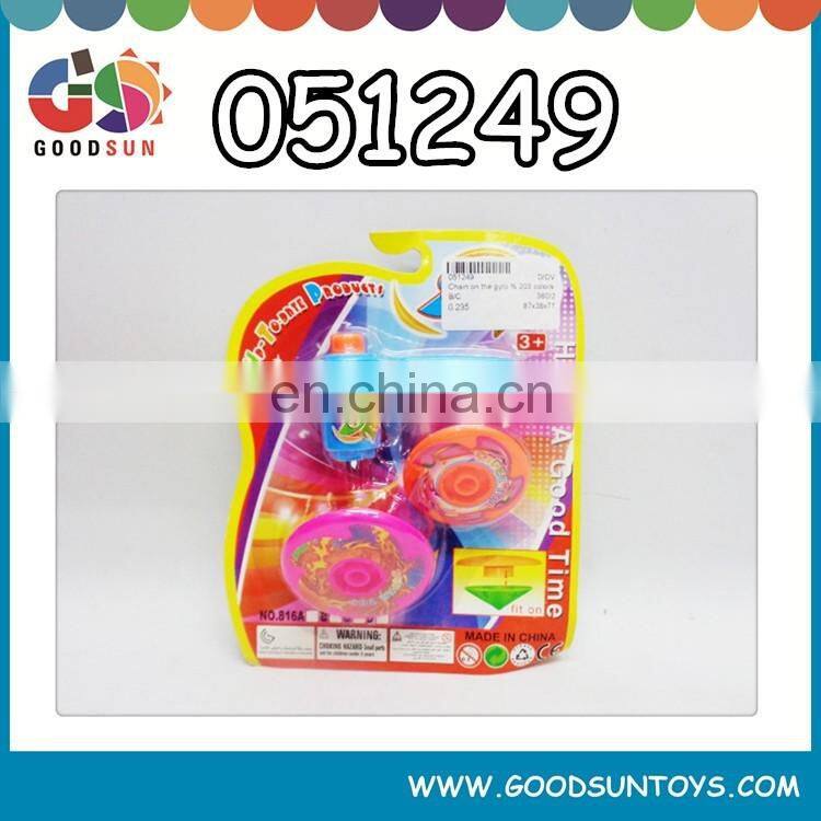 Promotional colorful wind up toy spinning top toy