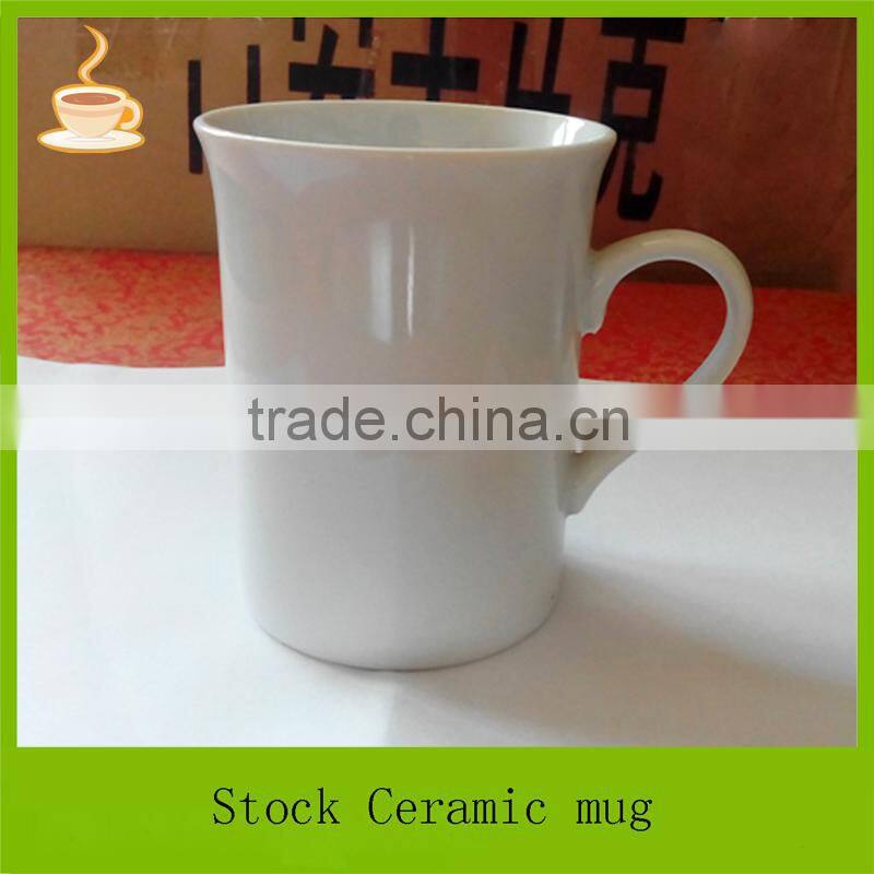 10oz blank white ceramic stocked mugs with flaring mouth and ear shape handle, stocklot cups for promotion