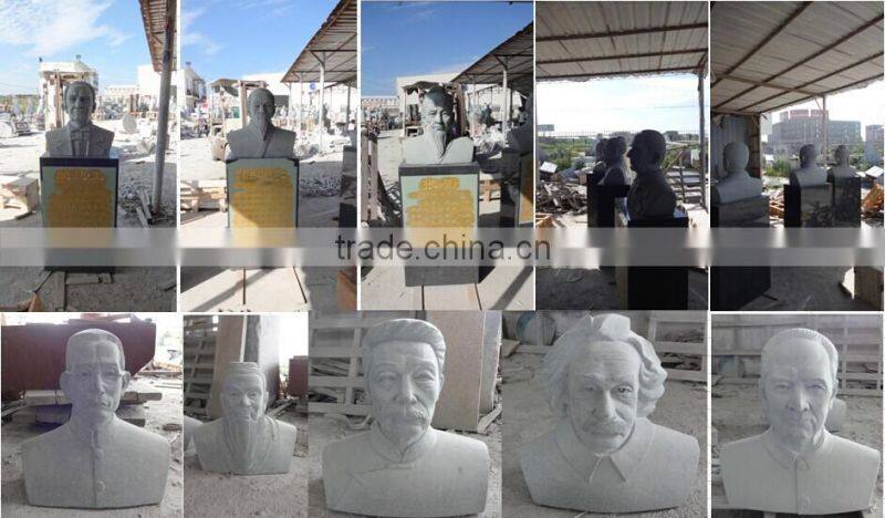 white grey stone outside decorative busts