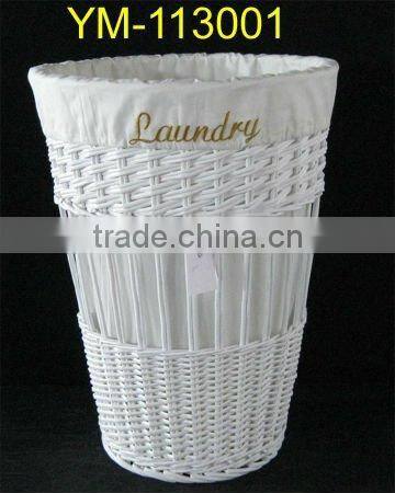 large round white wicker laundry basket