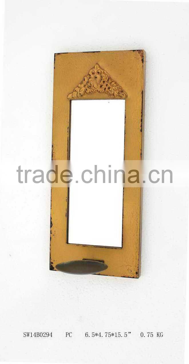 wall candle holder with metal base in yellow color